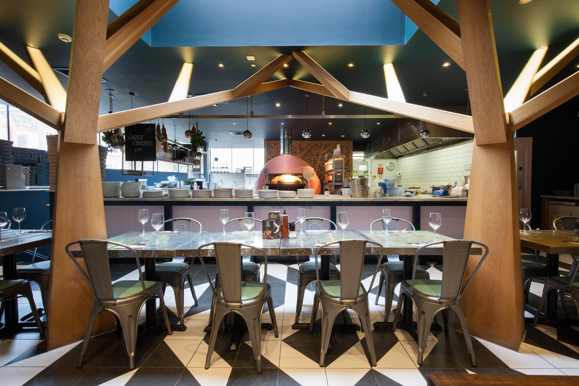 Warm and stylish Zizzi Worcester interior with Italian décor and open kitchen.