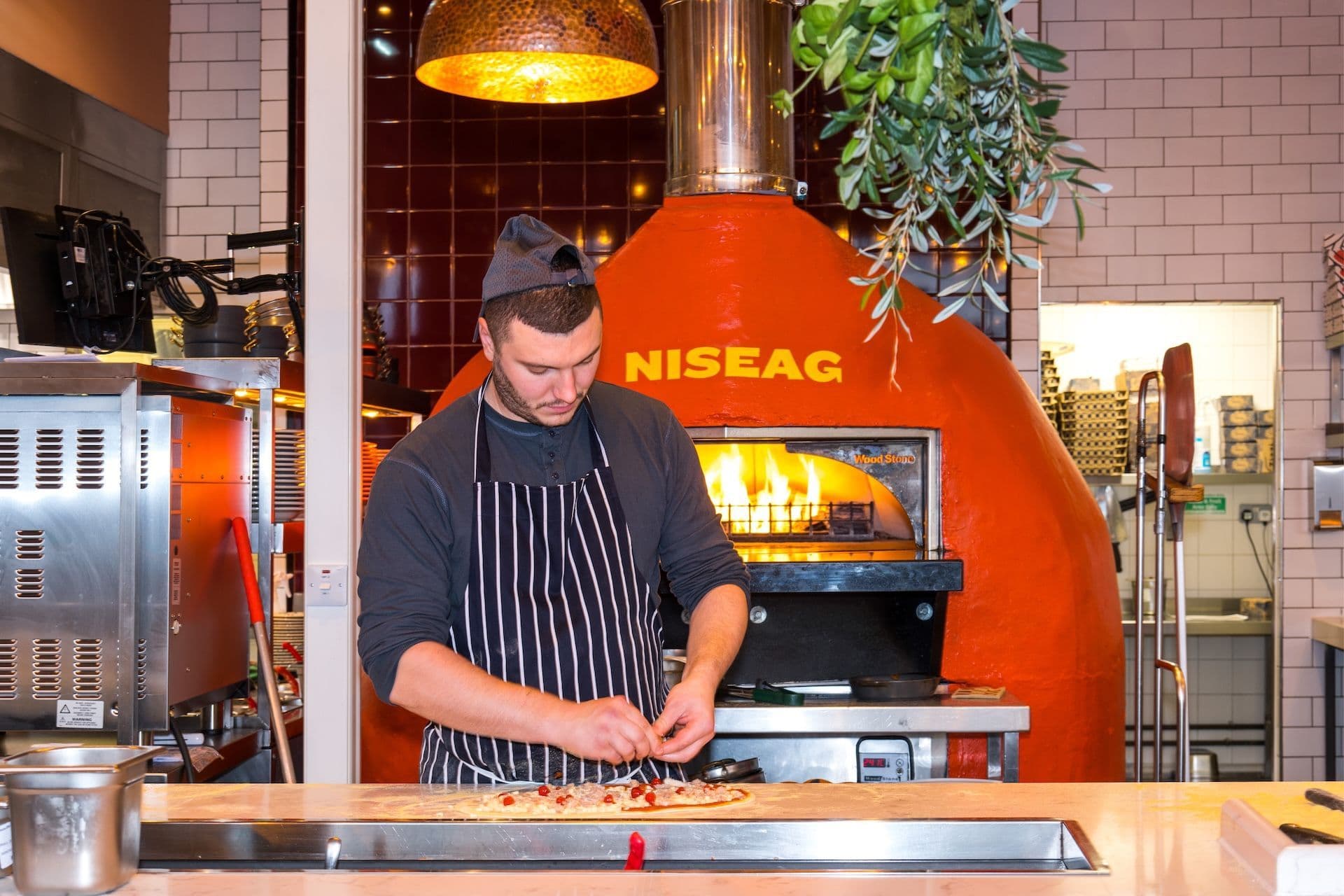 Zizzi Inverness open plan kitchen with pizza oven