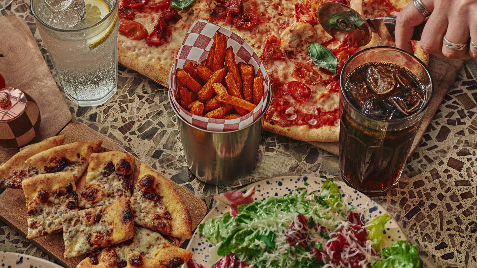 Feast shot of pizza, garlic bread and salad