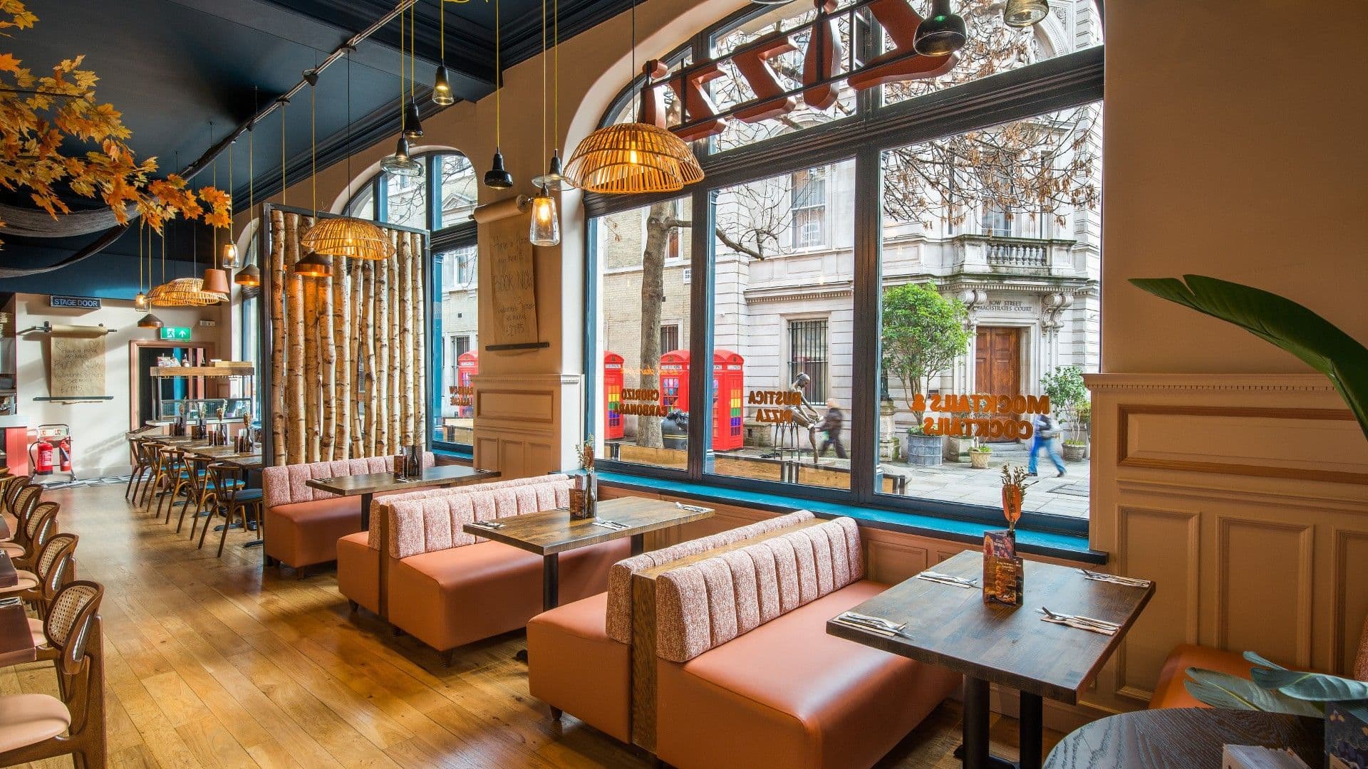 Tables and chairs Zizzi Bow Street.