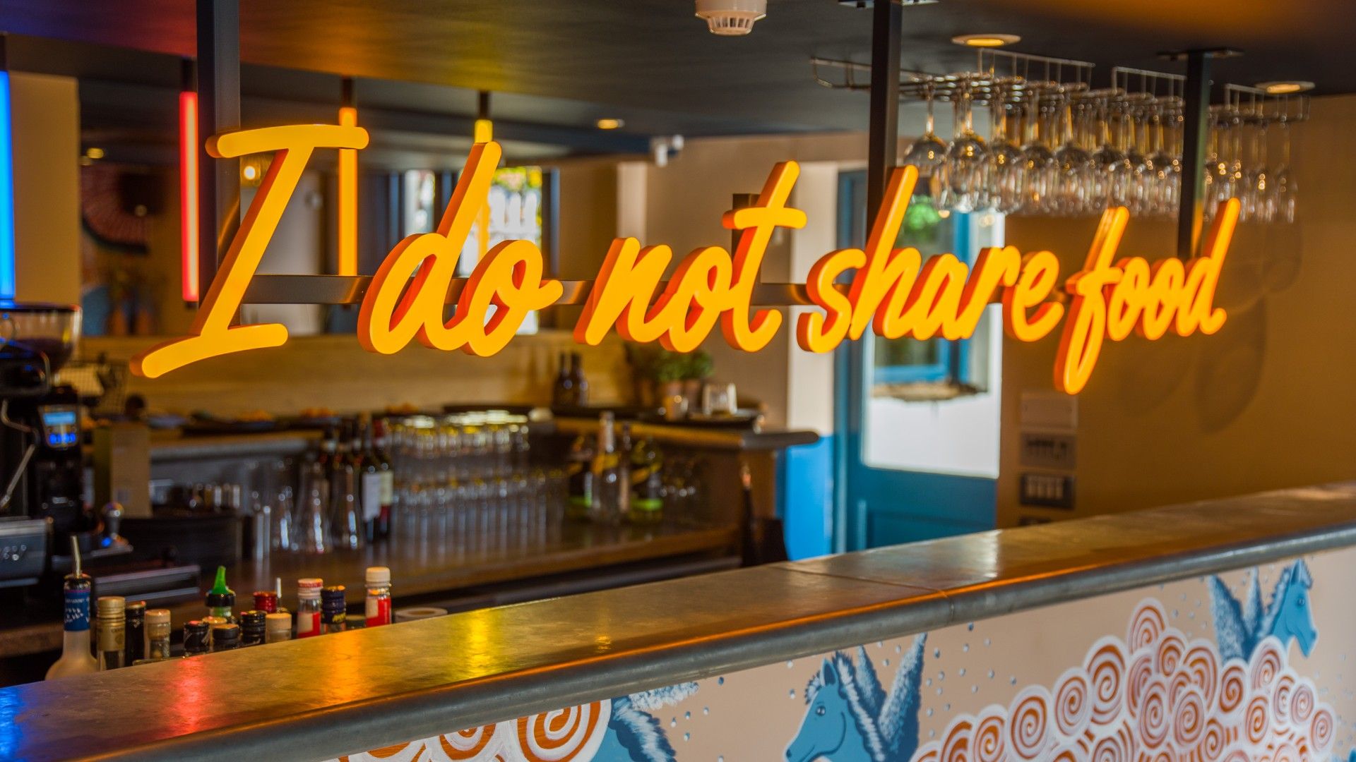 Neon sign saying I do not share food Zizzi Banstead 