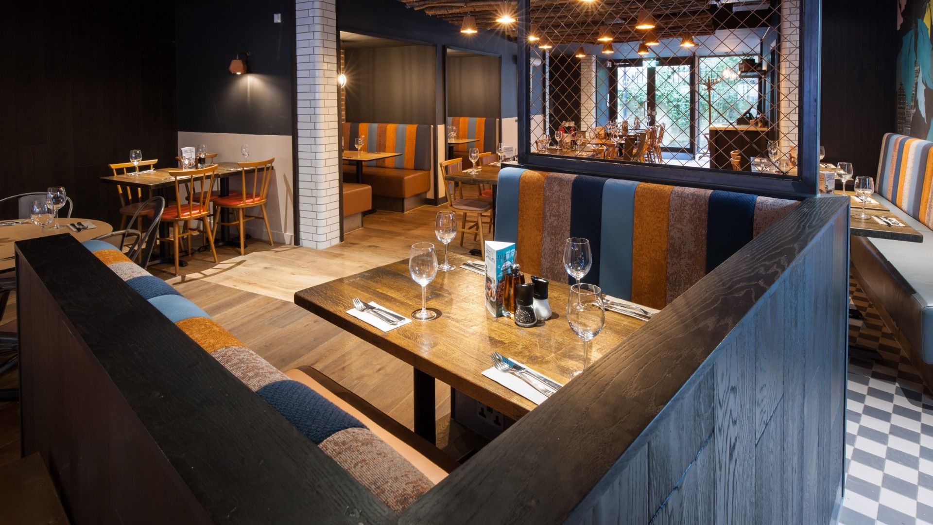 Table view of Booth seating area Zizzi Bath. 