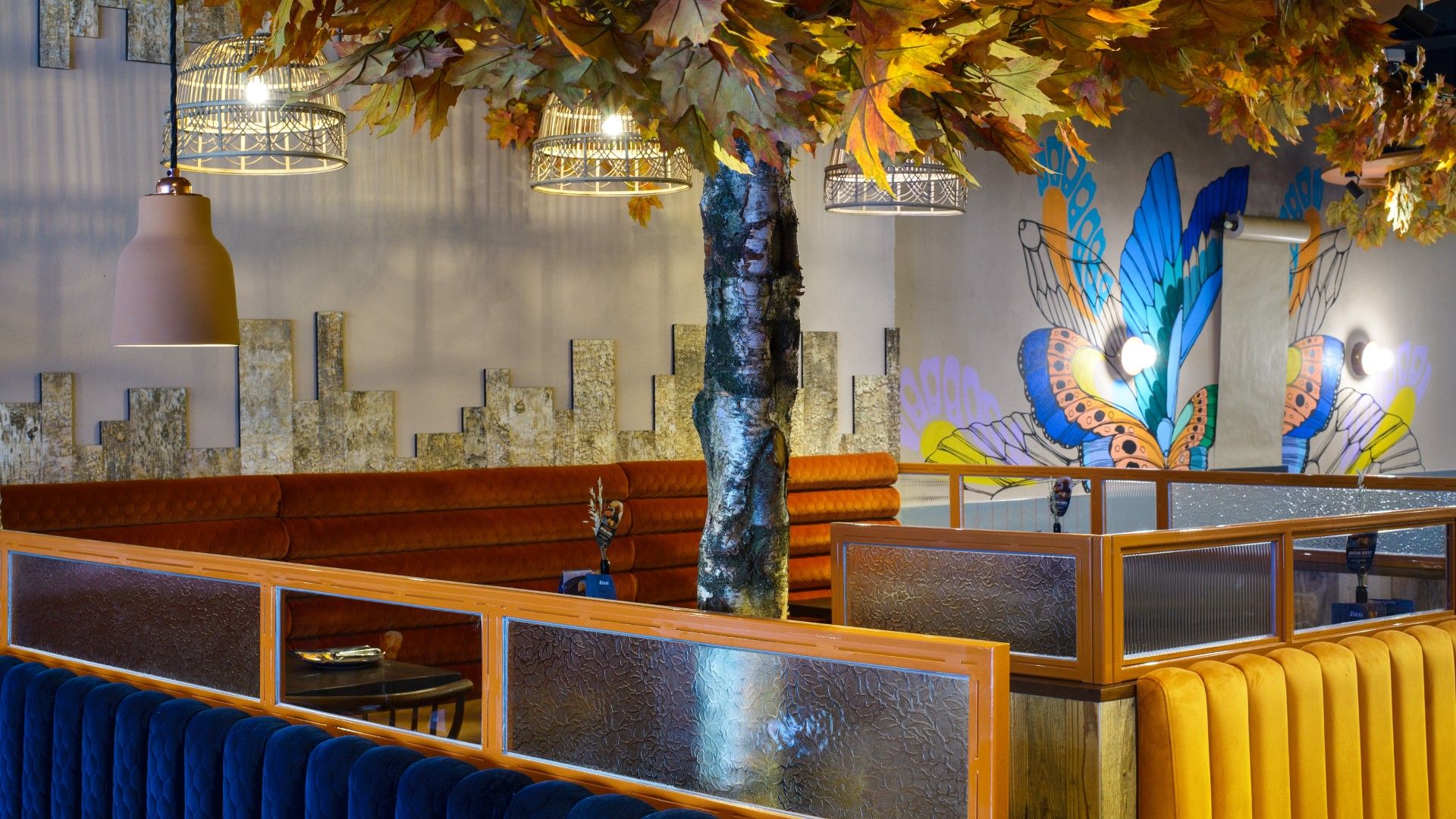 Booth and vibrant tree Zizzi Lancaster 
