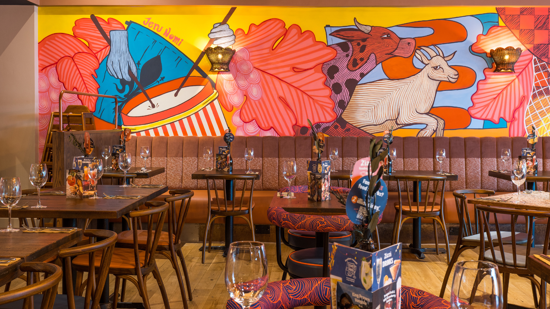 Zizzi Reading Oracle inside seating with tables, chairs and artwork 