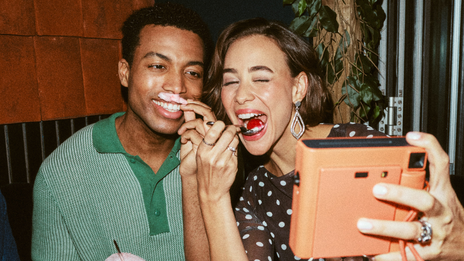 Friends taking selfies and smiling 