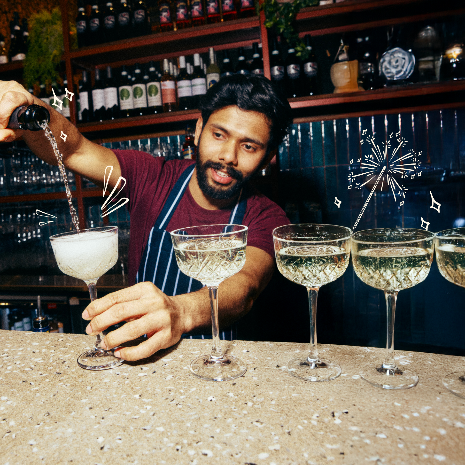Barman pouring Prosecco 
