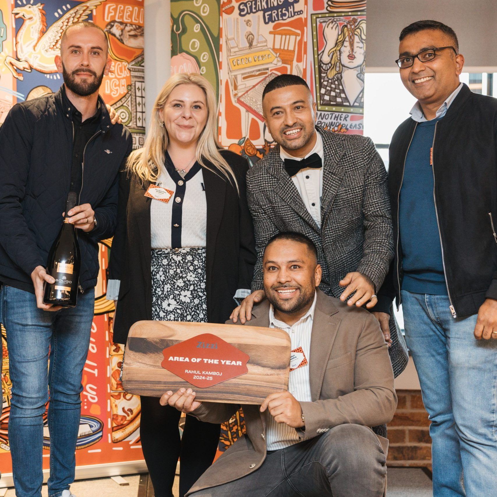 Group shot of the winners of the best restaurant area 