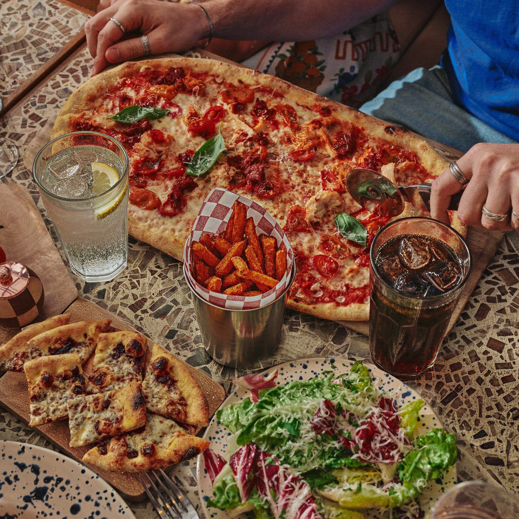 Pizza, two sides, two soft drinks 